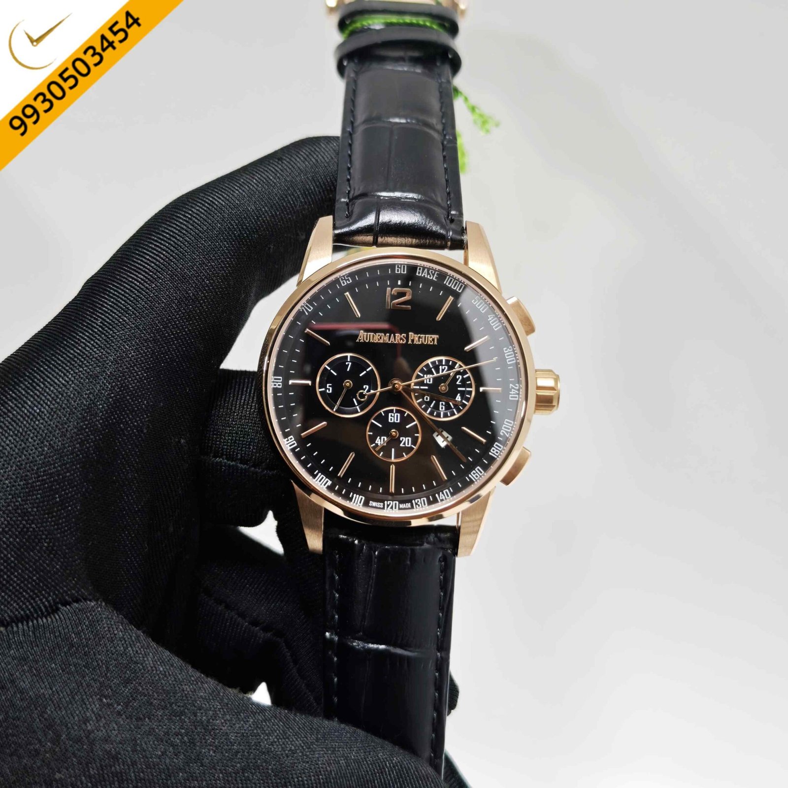 Audemars Piguet Code 11.59 Swiss automatic chronograph featuring a rose gold case, elegant black dial, premium leather strap, and luxury Swiss mechanical movement.