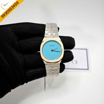 Gucci 25H Golden Bazel Ocean Blue Dial Stainless Steel Strap Swiss Quartz Watch