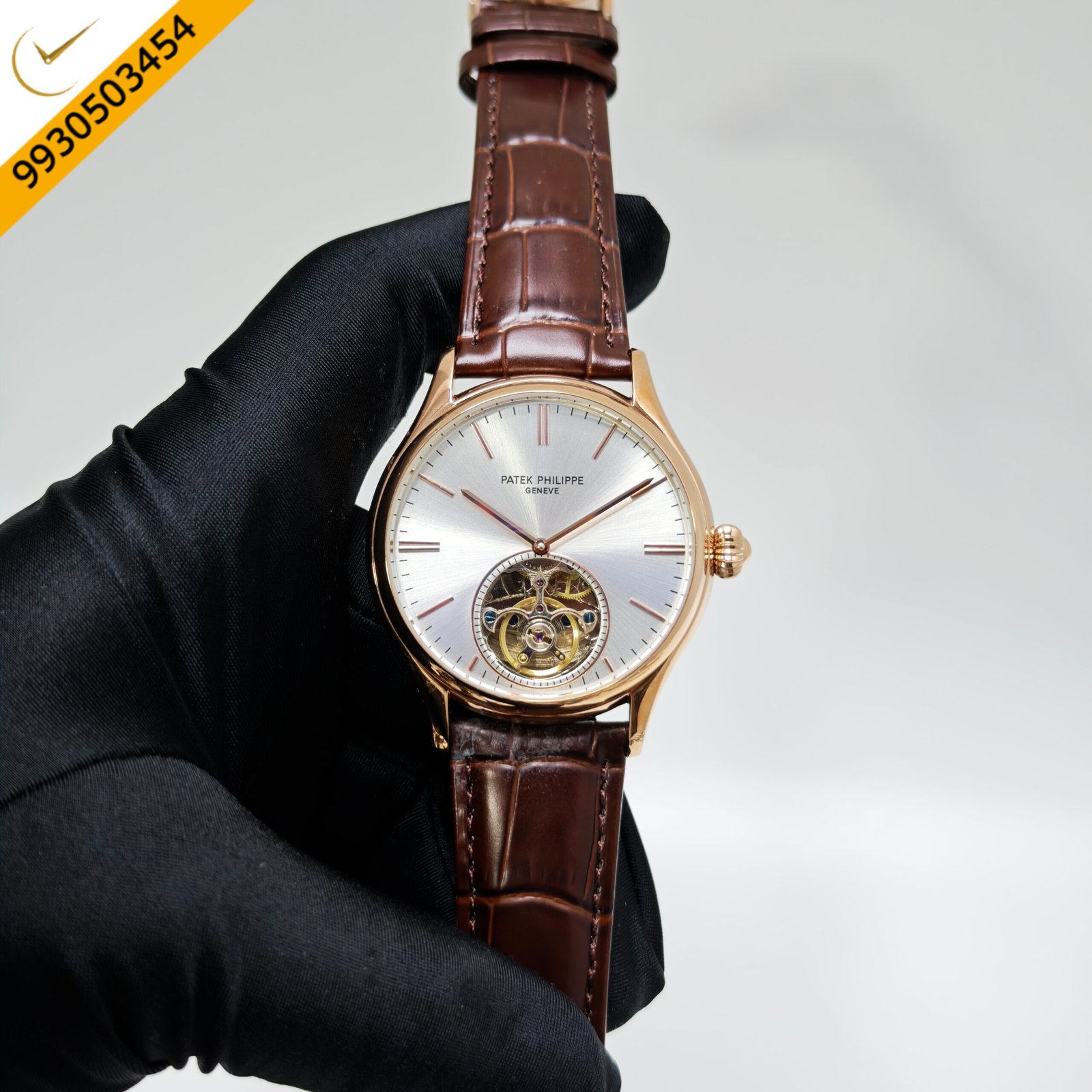 Patek Philippe Genève Tourbillon Swiss automatic watch featuring a rose gold case, silver dial, brown leather strap, and precision tourbillon movement for timeless luxury and exceptional craftsmanship.