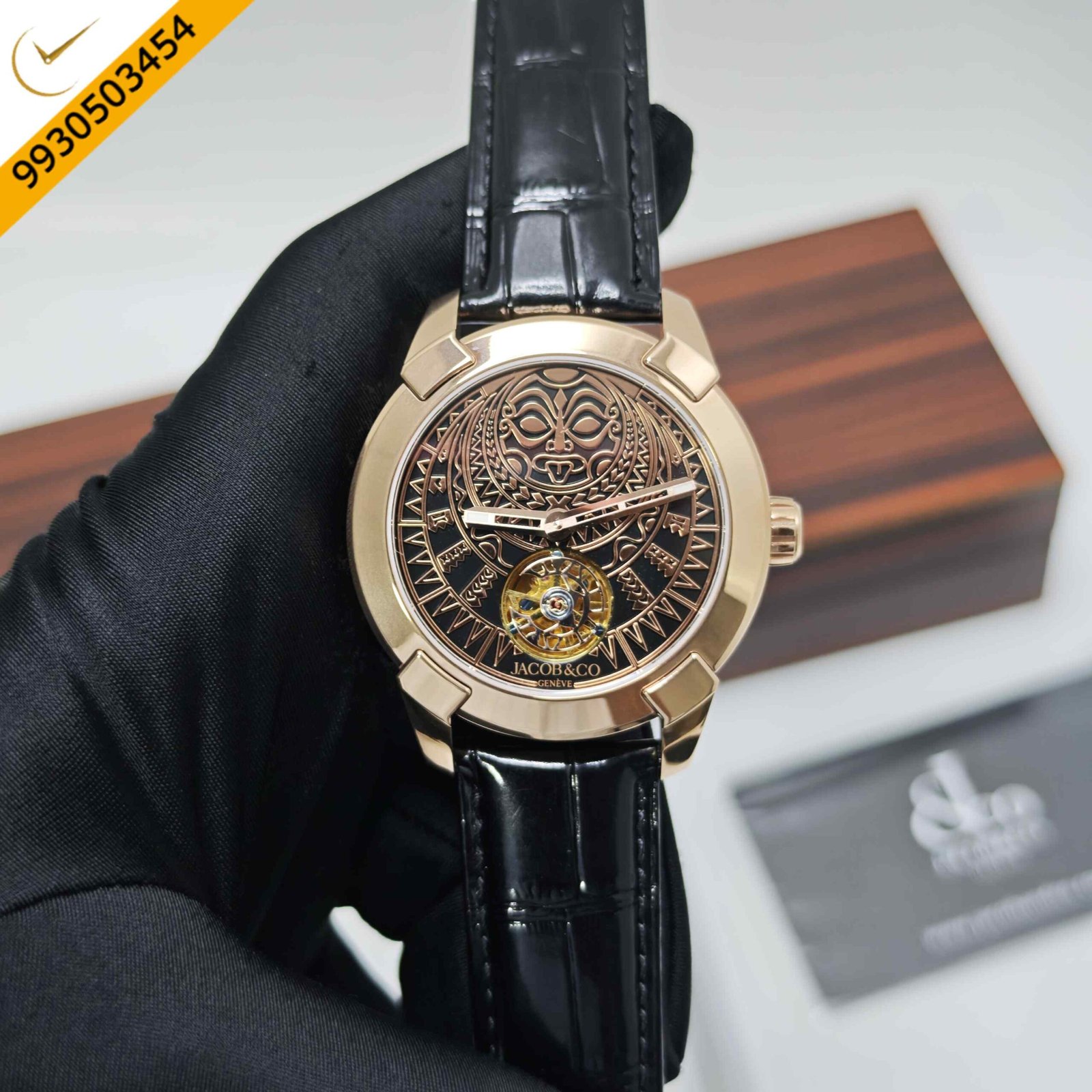 Jacob & Co Pioneer Aztec Calendar Swiss automatic watch featuring a rose gold case, black skeleton dial, black leather strap, and luxury mechanical calendar movement.