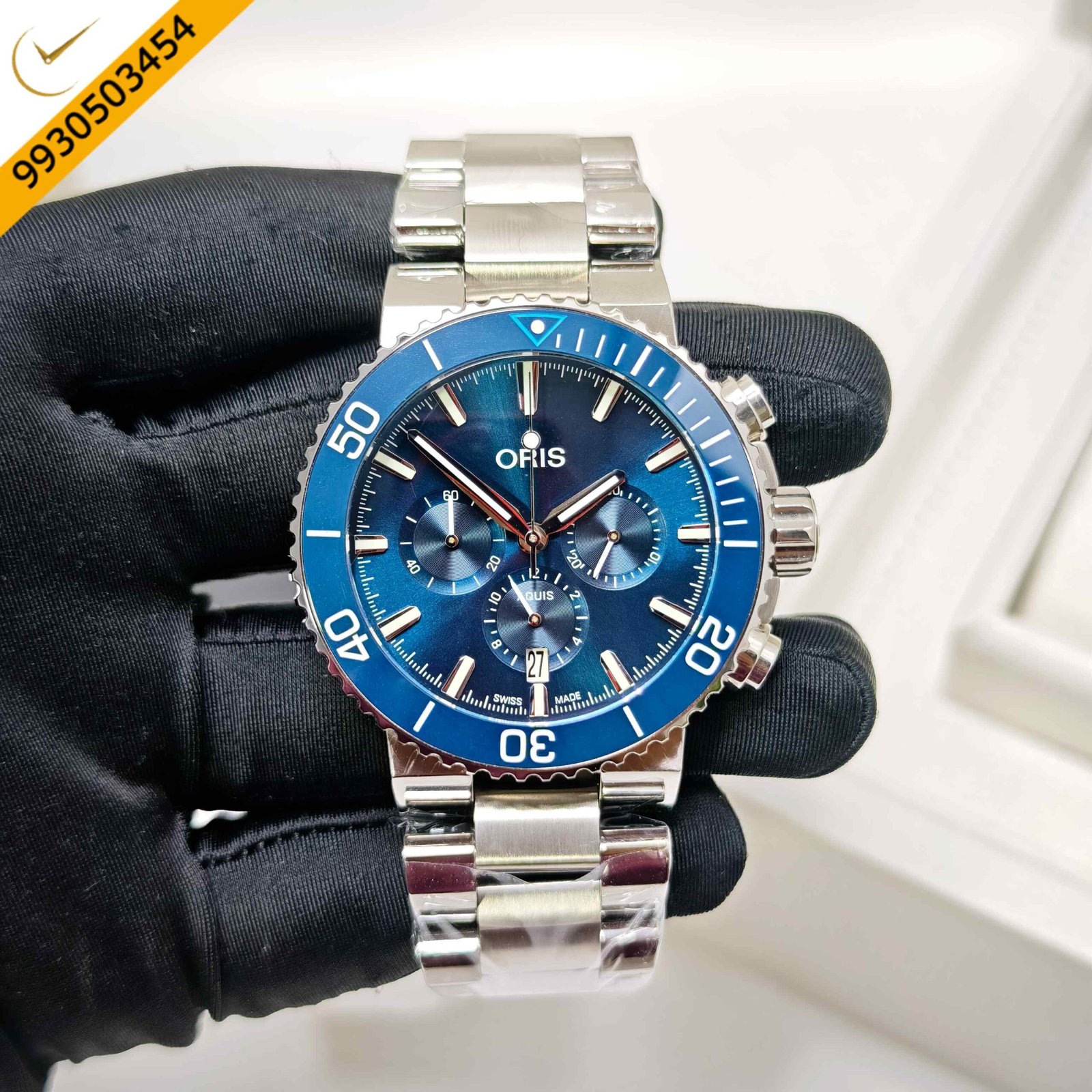 Oris Aquis Chronograph stainless steel Swiss automatic watch featuring a striking blue dial, robust steel bracelet, precision chronograph function, and professional dive-inspired luxury design.