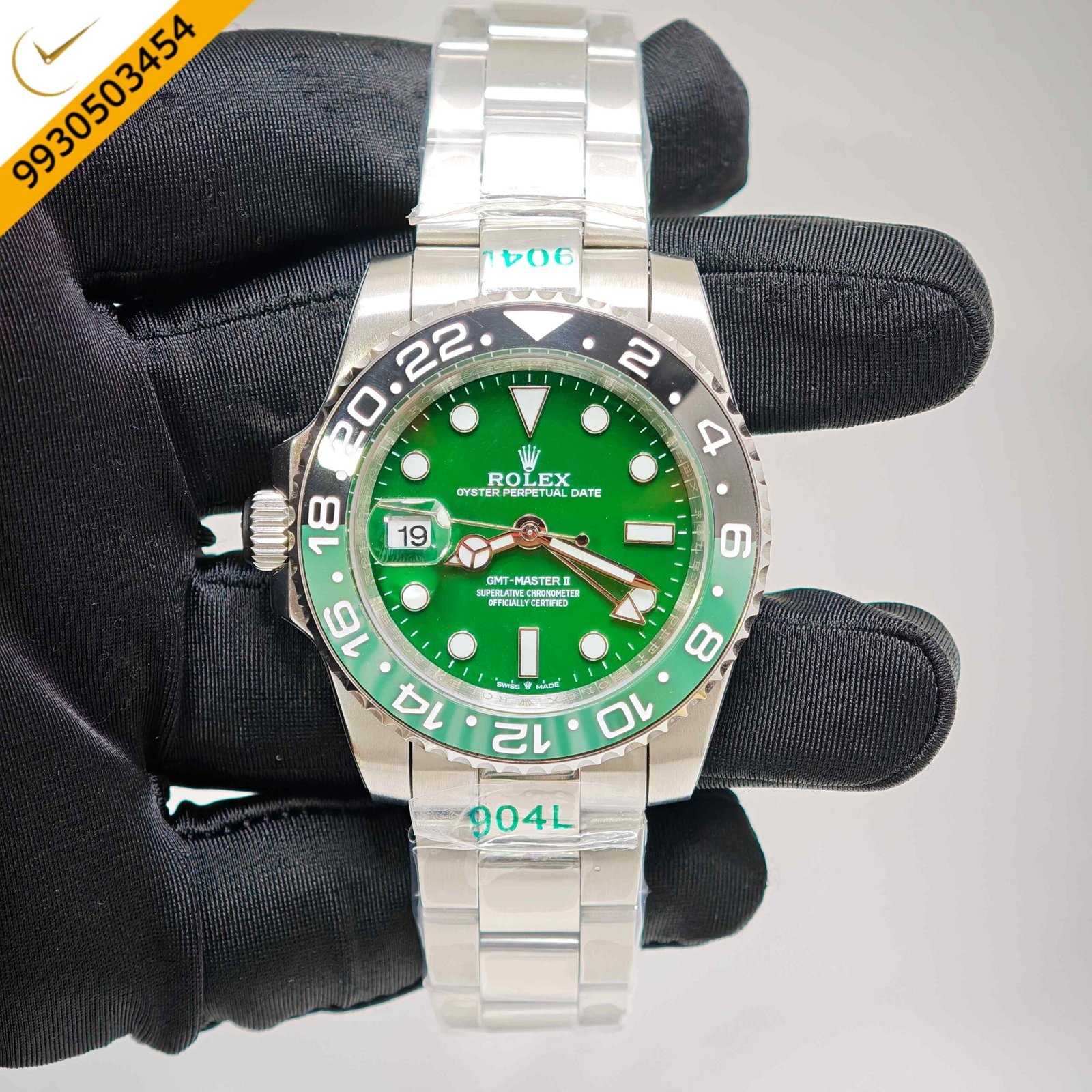 Rolex GMT-Master II stainless steel Oyster bracelet watch featuring a striking green dial, Swiss automatic GMT movement, dual time zone functionality, and premium luxury craftsmanship.