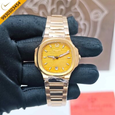 Patek Philippe Nautilus rose gold watch featuring a vibrant orange dial, Swiss Semi ETA quartz movement, luxury integrated bracelet, and iconic Nautilus-inspired design.