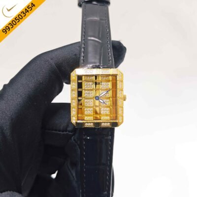 Piaget Vintage gold Swiss quartz watch featuring a diamond-set dial, polished gold case, black leather strap, and timeless luxury dress watch design.