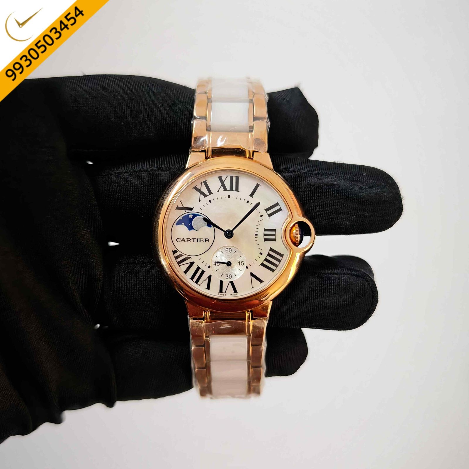 Cartier Ballon Bleu de Cartier Swiss semi-automatic watch featuring a mother-of-pearl dial, white ceramic case and bracelet with rose gold accents, showcasing timeless luxury and elegant Swiss craftsmanship.
