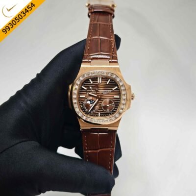 Patek Philippe Nautilus Moon Phase Diamond Baguette Brown Dial Brown Rubber Strap Swiss Automatic Watch